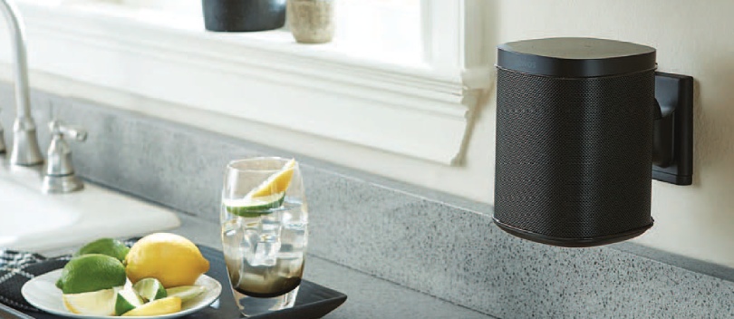 Speaker on the wall in a kitchen.